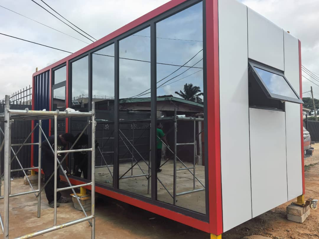 Africa Mobile Homes prefabricated mobile home unit under construction with glass façade