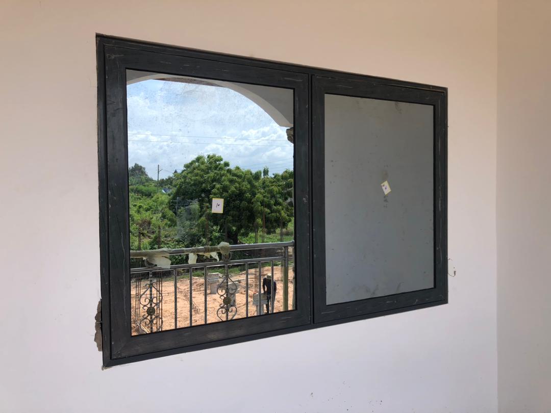 Twin-panel aluminium window frame finished to quality standard